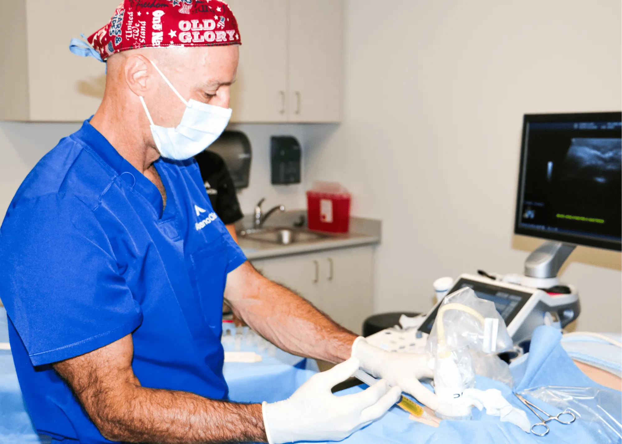 Dr. Albano performing a regenerative medicine procedure